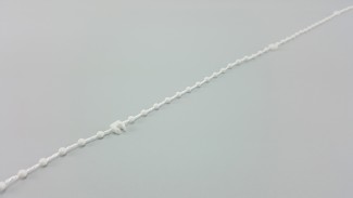 Szalagfüggöny alsó rendező gyöngy